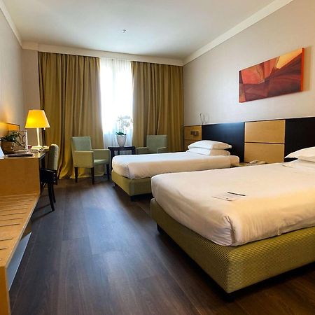 Best Western Plus Hotel Le Favaglie Cornaredo Bagian luar foto