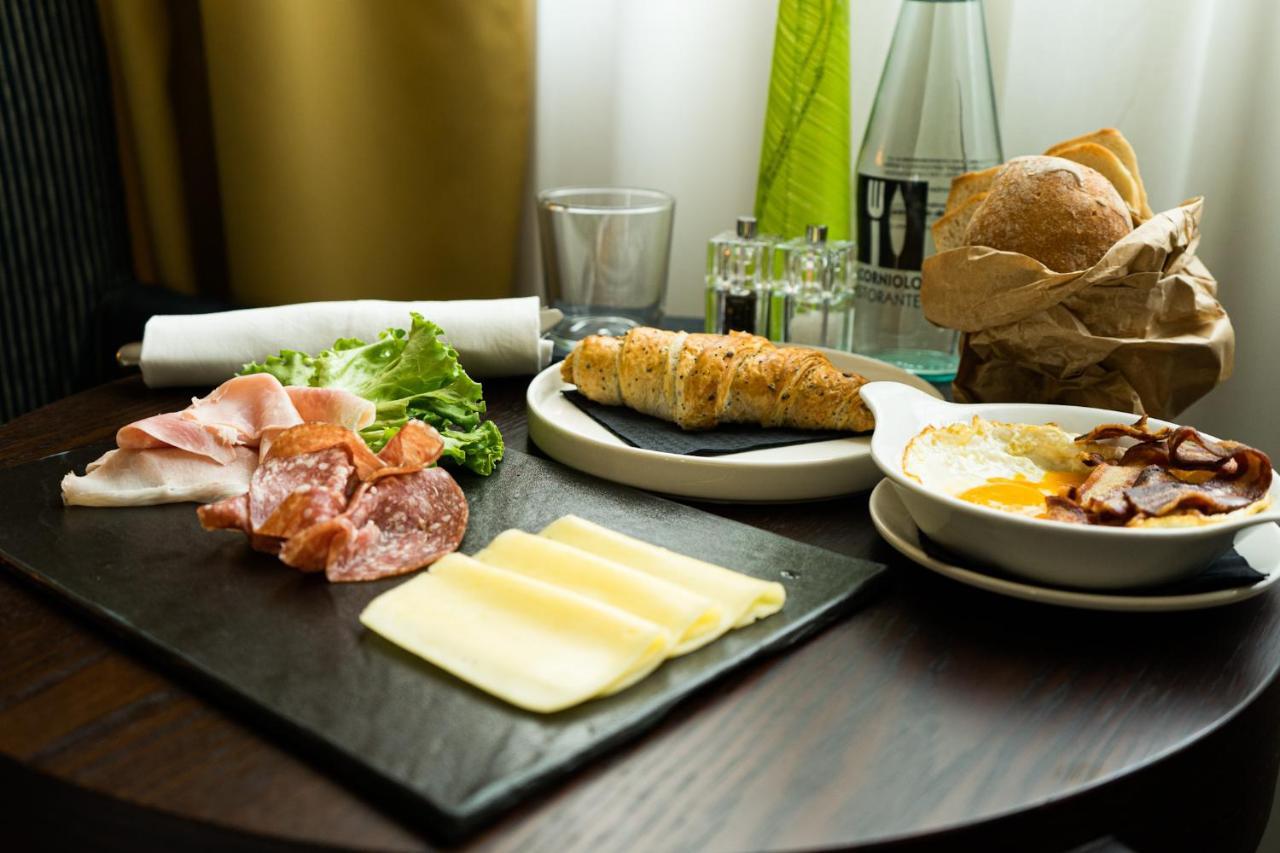 Best Western Plus Hotel Le Favaglie Cornaredo Bagian luar foto